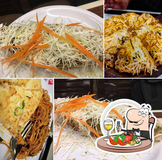 Try out various seafood meals available at Amar Fast Food & Juice Center