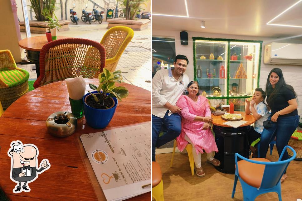 Take a seat at one of the tables at Thhikana cafe