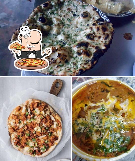 Try out pizza at Mangu Chicken Corner Dhaba