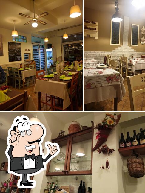 Siediti a un tavolo di Olio e Pomodoro Pizzeria Ristorantino Civitanova Marche