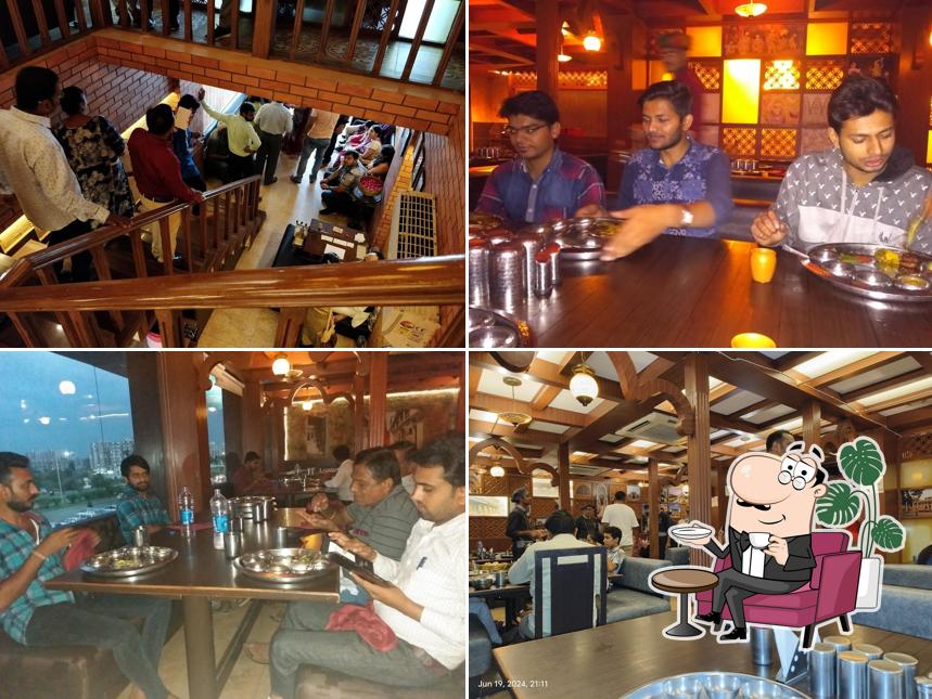 Take a seat at one of the tables at Madhav ni Pol