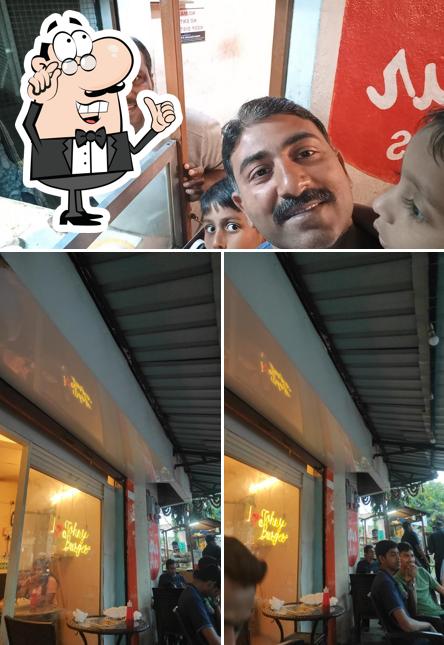 Take a seat at one of the tables at Johny Burger