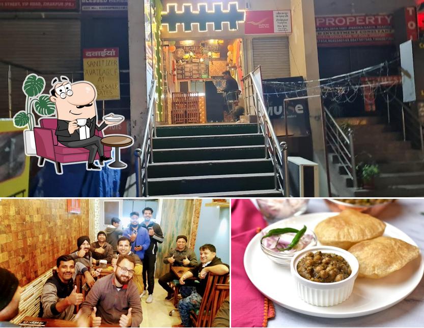 This is the photo depicting interior and food at Kulcha Theka