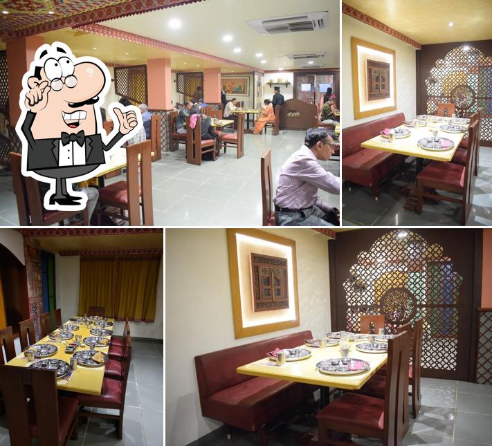 Take a seat at one of the tables at Vangi Dining Hall - Best Restaurants, Gujarati Thali, Veg Restaurants, Gujarati Restaurants