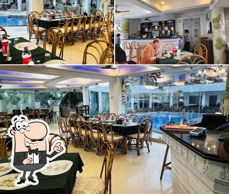 Take a seat at one of the tables at Veggie Delight Goa