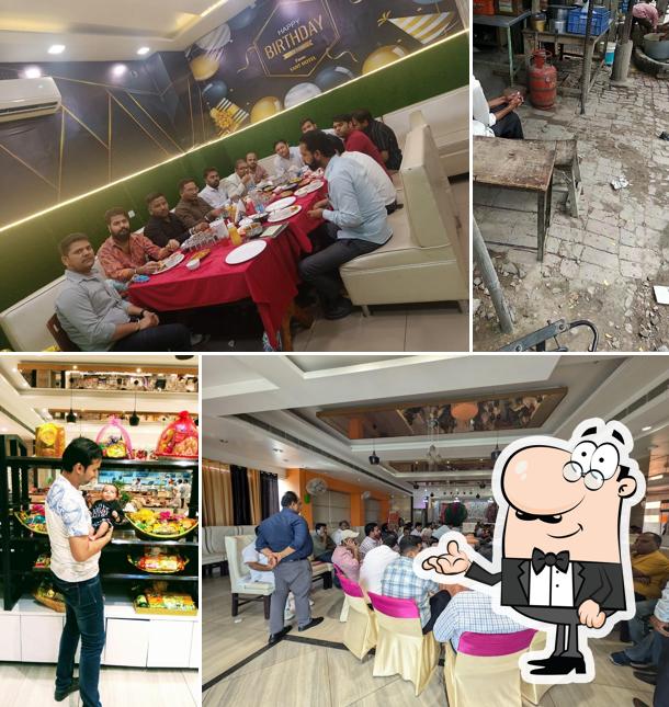 Take a seat at one of the tables at H o t e l R o m a n z a