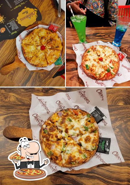 Get pizza at Cafe Chocolicious