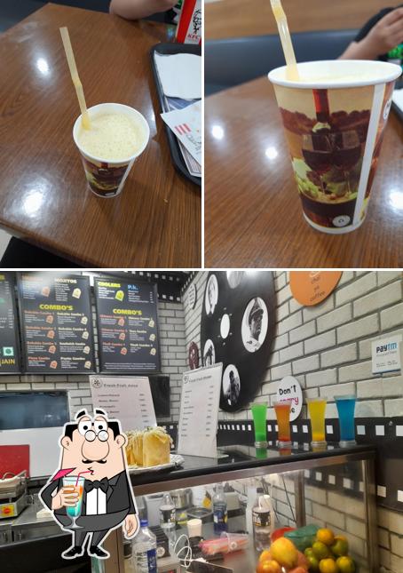 The photo of drink and interior at Cafe Bollywood