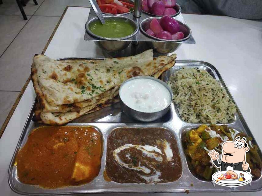 At New Raja vaishno bhojnalaya, you can enjoy pizza