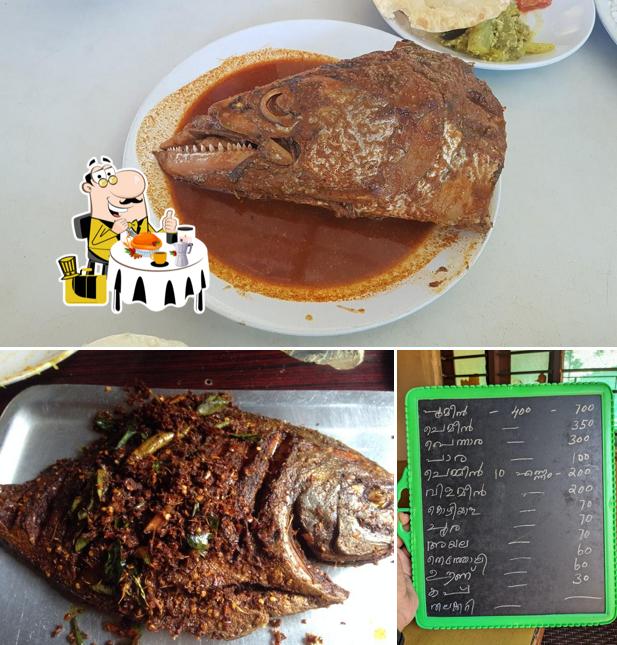 This is the picture displaying food and blackboard at Aswathi Hotel