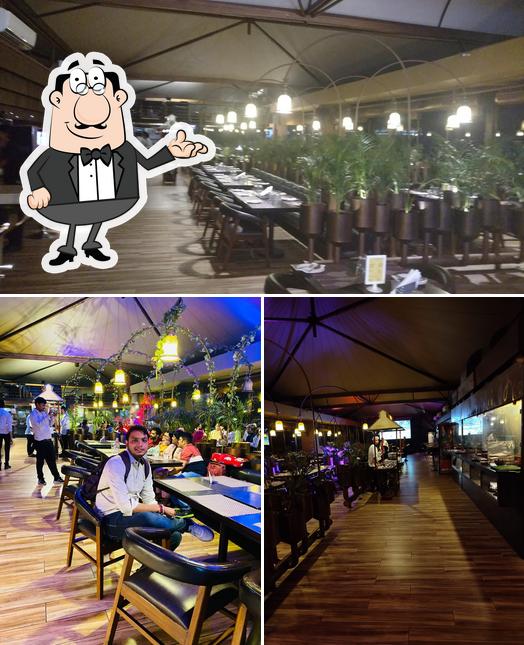 Take a seat at one of the tables at OTB On The Bar BQ