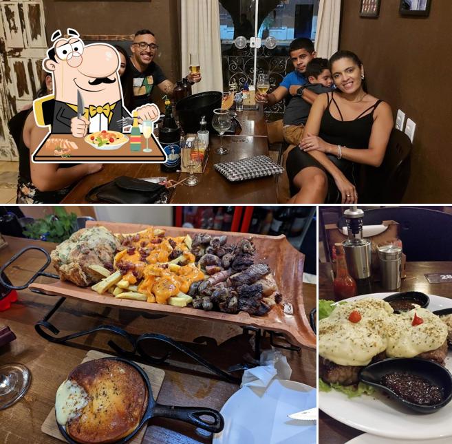 A ilustração do El Chivo - Parrilla e Bar’s comida e interior