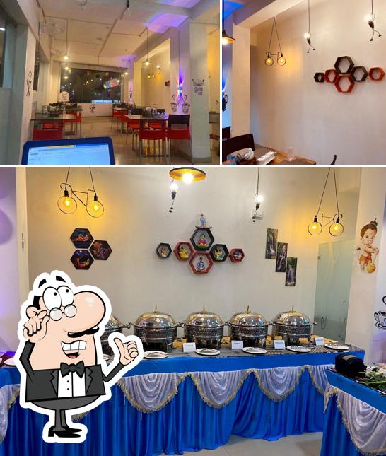 Take a seat at one of the tables at The FOOD HUB