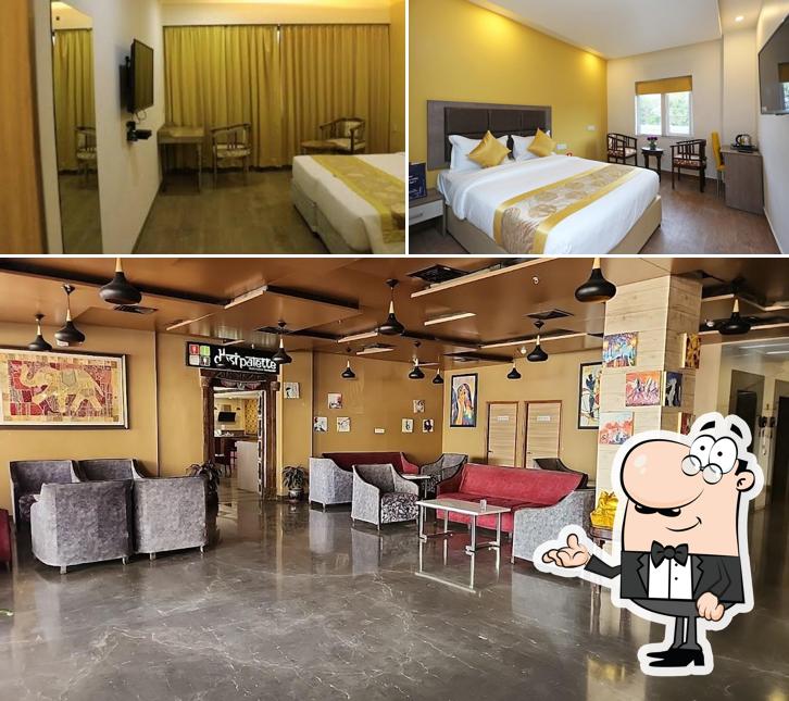 Take a seat at one of the tables at Cosmopolitan Hotel