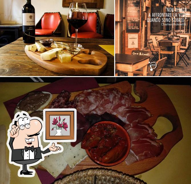 Questa è la foto che presenta la interni e cibo di Covo Bukowski