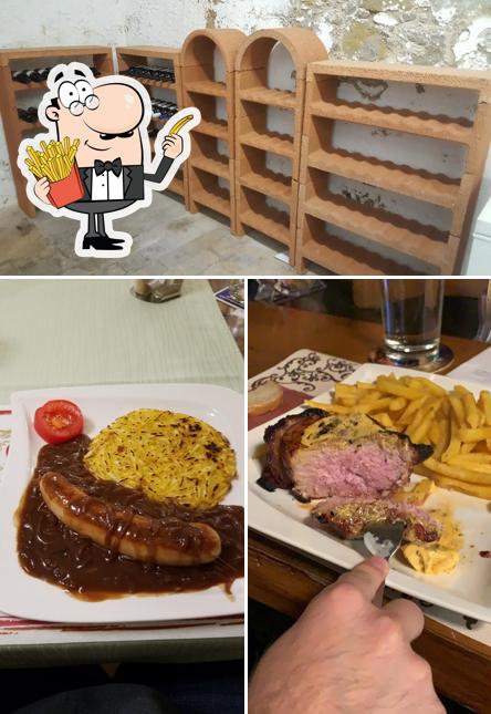 Ordina un piatto di patatine a Restaurant Post