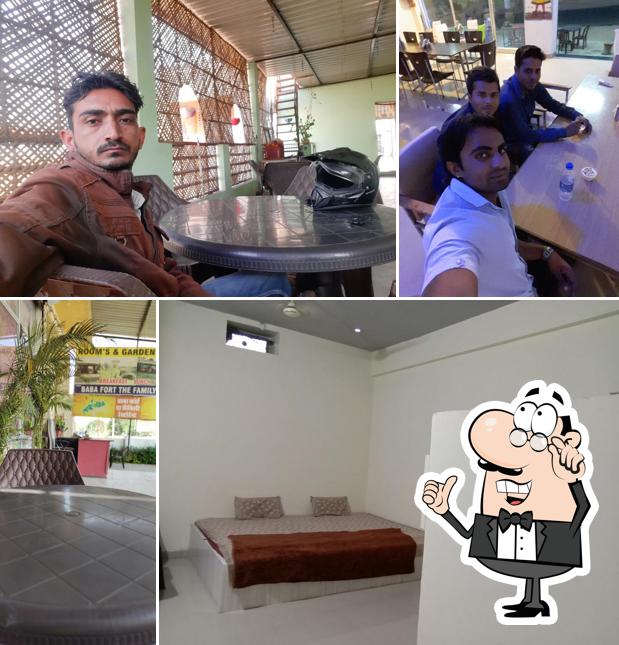 Take a seat at one of the tables at Baba fort the family restaurent & room's