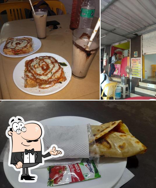 Take a look at the picture showing interior and food at Pizza House