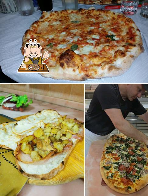 Prenditi una pizza a Ristorante Pizzeria Il Corallo sas