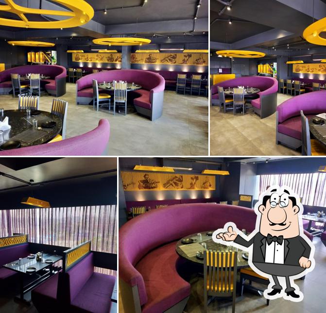 Take a seat at one of the tables at The Restaurant