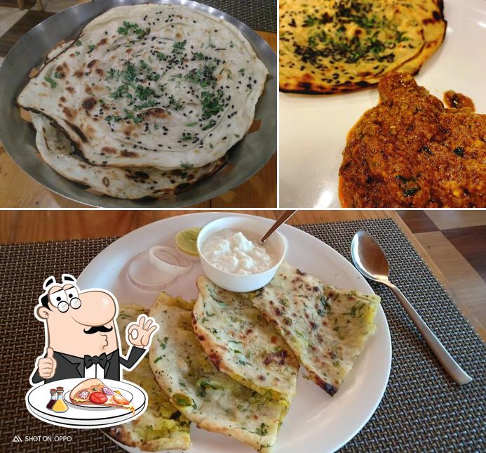 Pick pizza at Krushnai Pure Veg