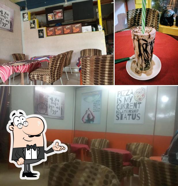 Among various things one can find interior and beverage at Pizza Arena