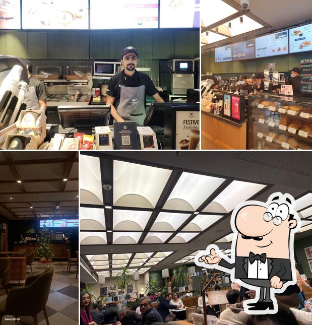 Take a seat at one of the tables at Third Wave Coffee