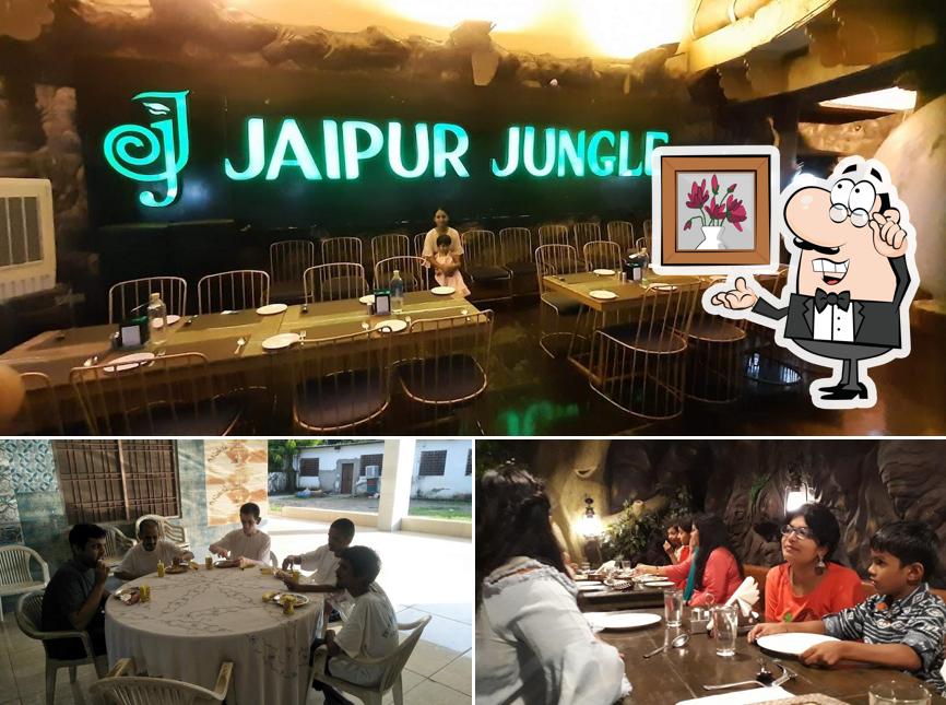 Take a seat at one of the tables at Jaipur Jungle