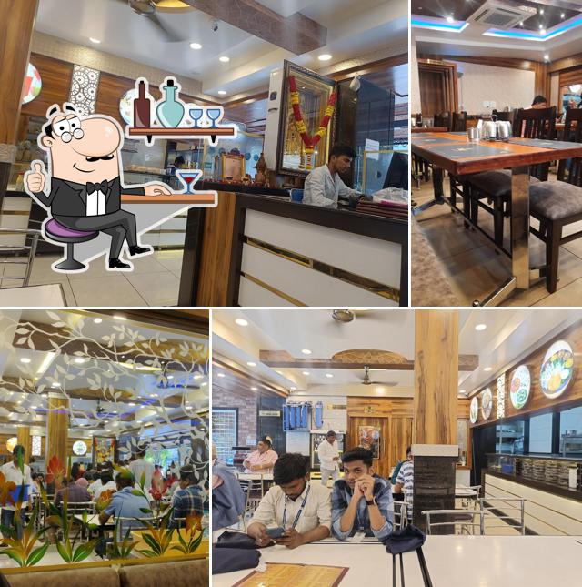 Take a seat at one of the tables at Sri Vishnu Park