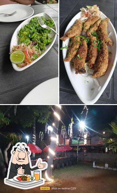 This is the image displaying food and interior at Court yard kitchen