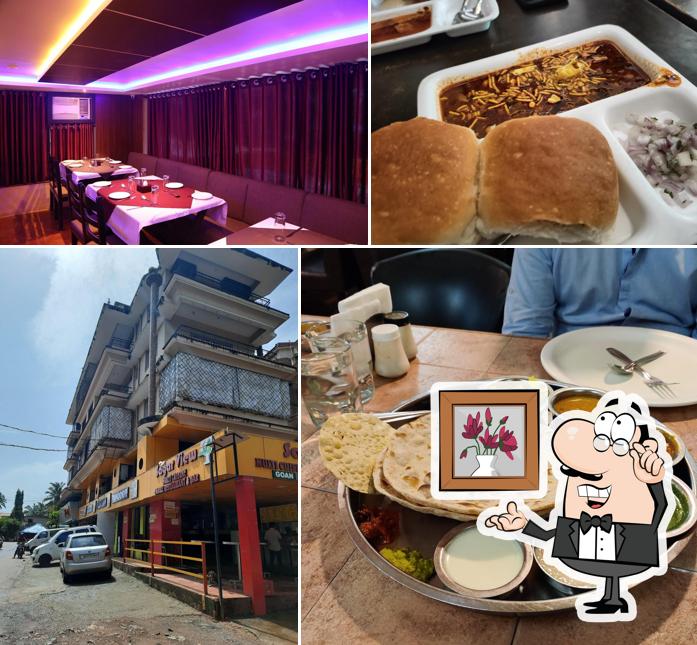 Take a seat at one of the tables at Sagar View Restaurant