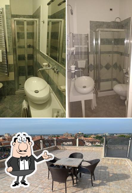 Siediti a un tavolo di Hotel Villa Tirreno