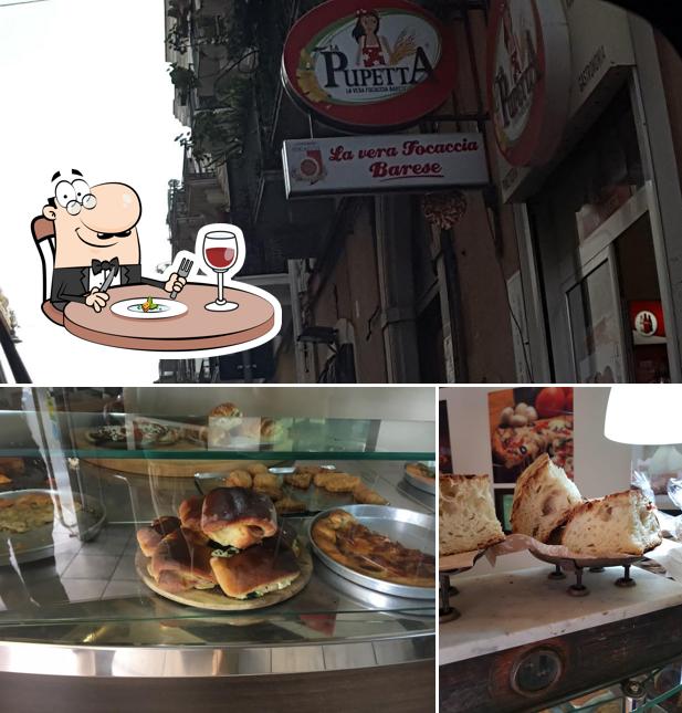 Tra le diverse cose da La Pupetta - focaccia si possono trovare la cibo e esterno