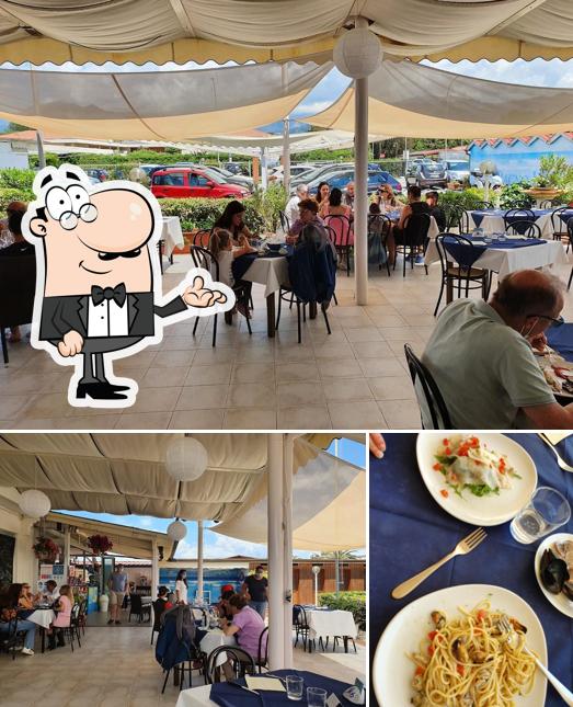 Questa è la foto che mostra la interni e cibo di Bagno Helvetia