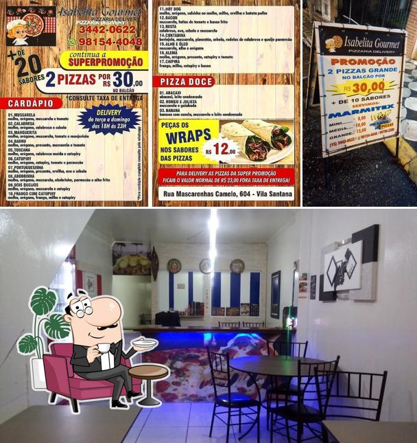 O interior do Pizzaria e Conveniência ISABELITA GOURMET