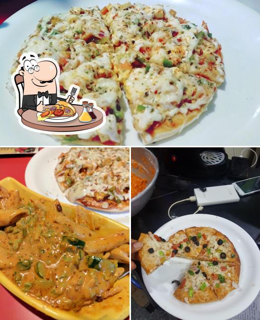 Get pizza at Pizza Corner