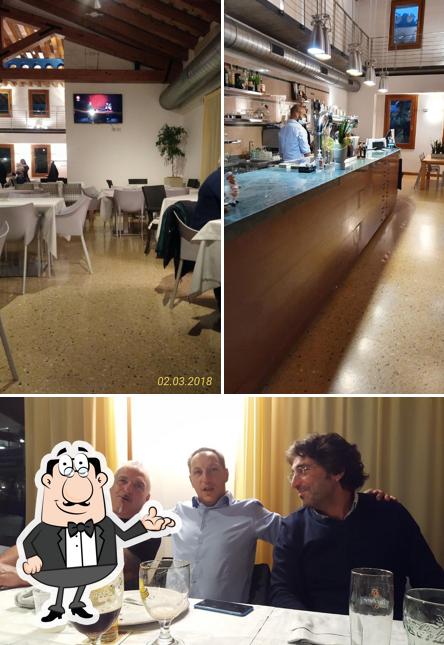 Dai un'occhiata agli interni di Pizzeria Il Corallo