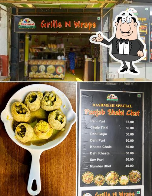 Take a seat at one of the tables at Grills and Wraps