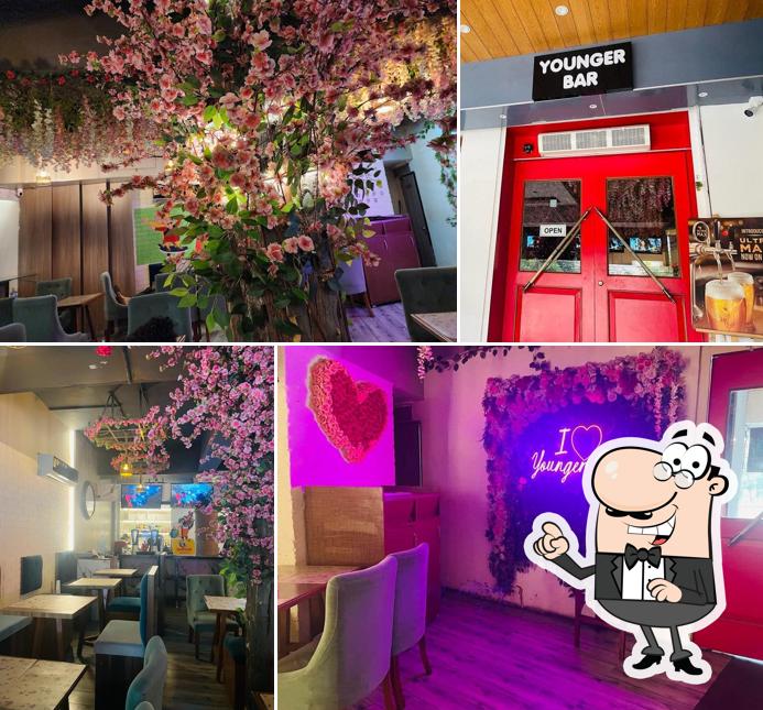 Take a seat at one of the tables at Younger Bar