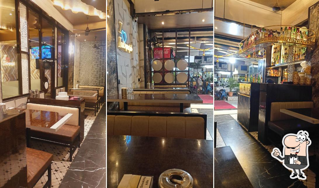 Take a seat at one of the tables at INDER PUNJAB KITCHEN