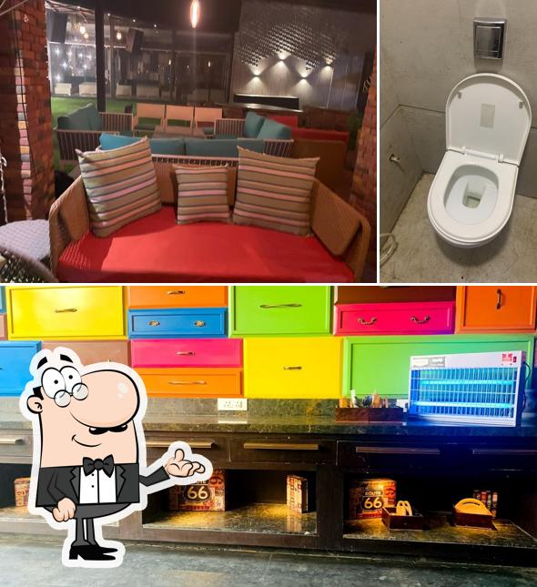 Take a seat at one of the tables at Route66 Cafe & Restro