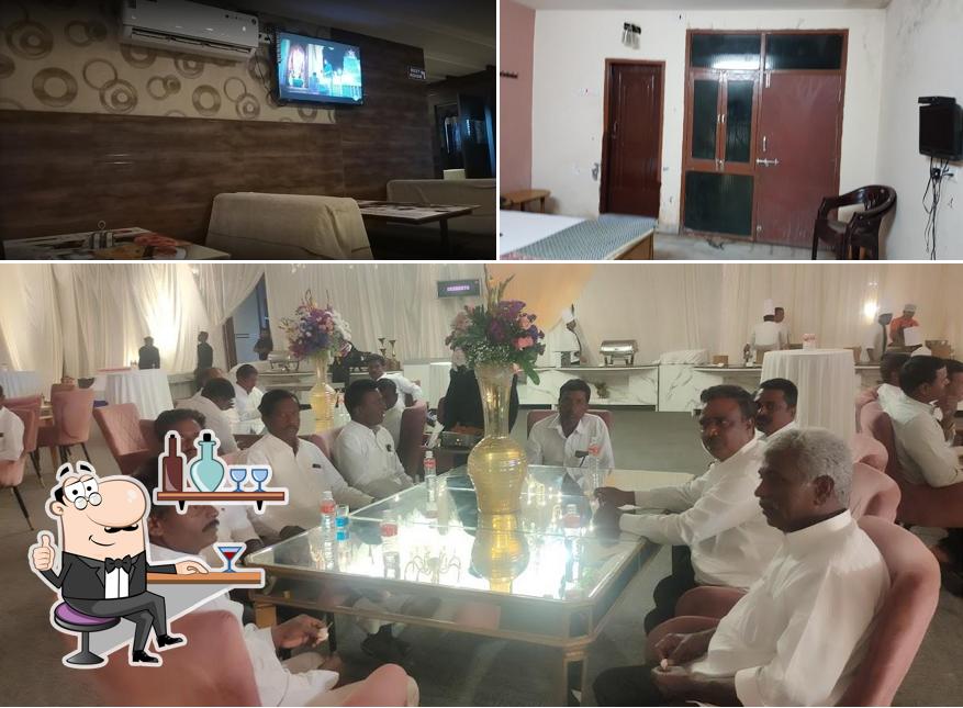 Take a seat at one of the tables at International Bar and Restaurant