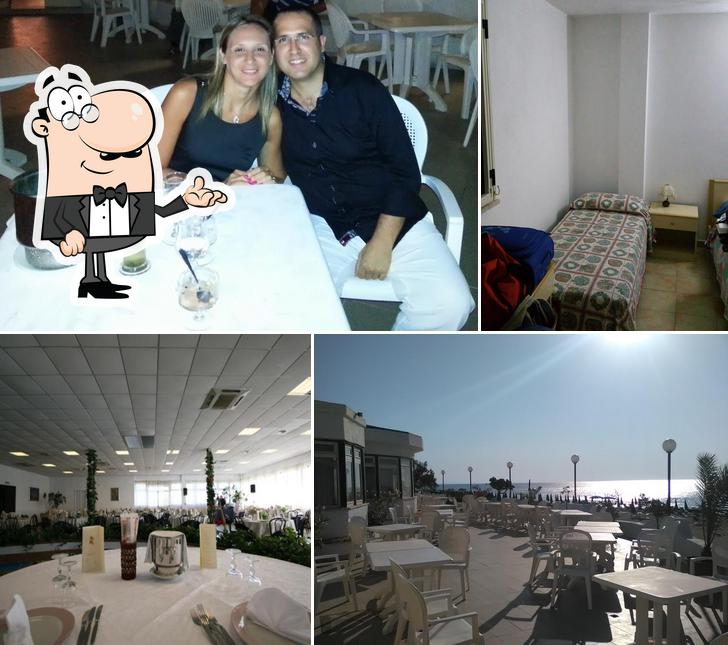 Siediti a un tavolo di Hotel Club Poseidon