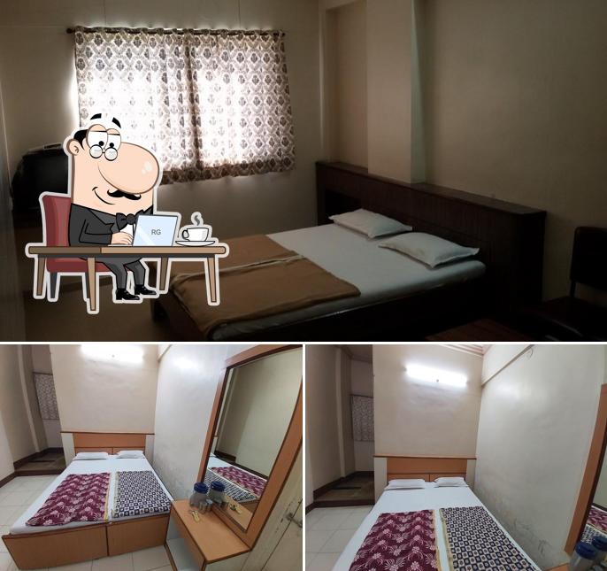 Take a seat at one of the tables at Hotel Padmalaxmi