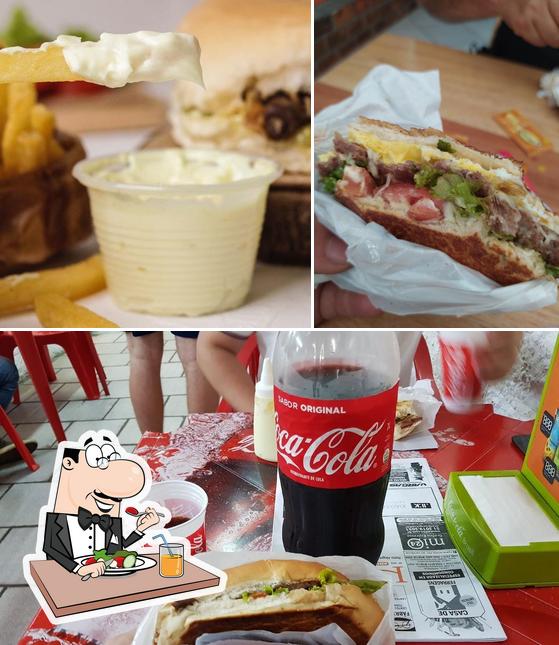 A ilustração da comida e bebida no Tia Lalá lanches