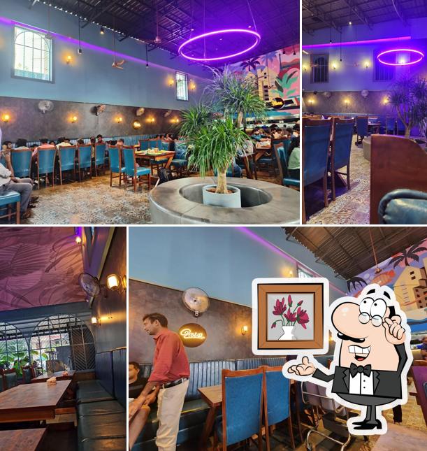 Take a seat at one of the tables at Urula Restaurant Kakkanad