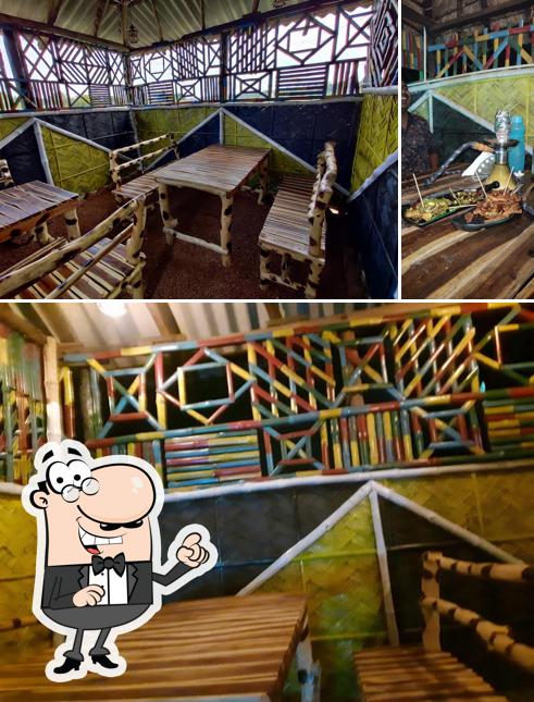 The photo of interior and dining table at Nil Nirjan restaurant cum bar