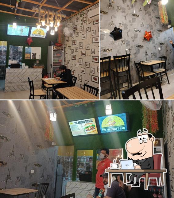 Take a seat at one of the tables at The Naughty Lab