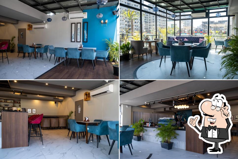 Take a seat at one of the tables at The Bungalow Cafe