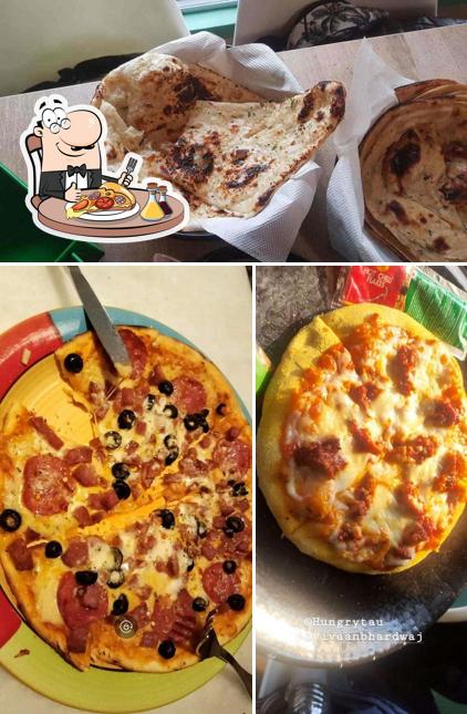 Try out pizza at Hungry Tau